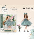 DOLL WITH RIBBON AND FLOWERS IN A BOX