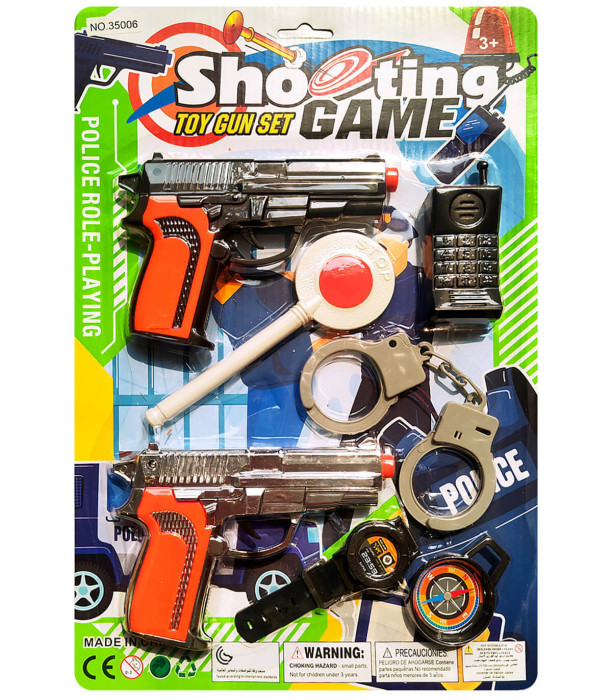 CHILDREN'S POLICE SET WITH 2 GUNS AND STOP SIGN ON CARDBOARD - PISTOLS