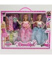 2 DOLLS WITH CLOTHES IN A BOX